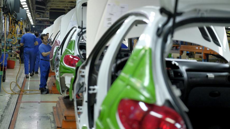 An Iranian technician works at a production line of carmaker Iran Khodro, west of Tehran February 6, 2016. REUTERS/Raheb Homavandi/TIMA ATTENTION EDITORS - THIS IMAGE WAS PROVIDED BY A THIRD PARTY. FOR EDITORIAL USE ONLY. - GF10000298282