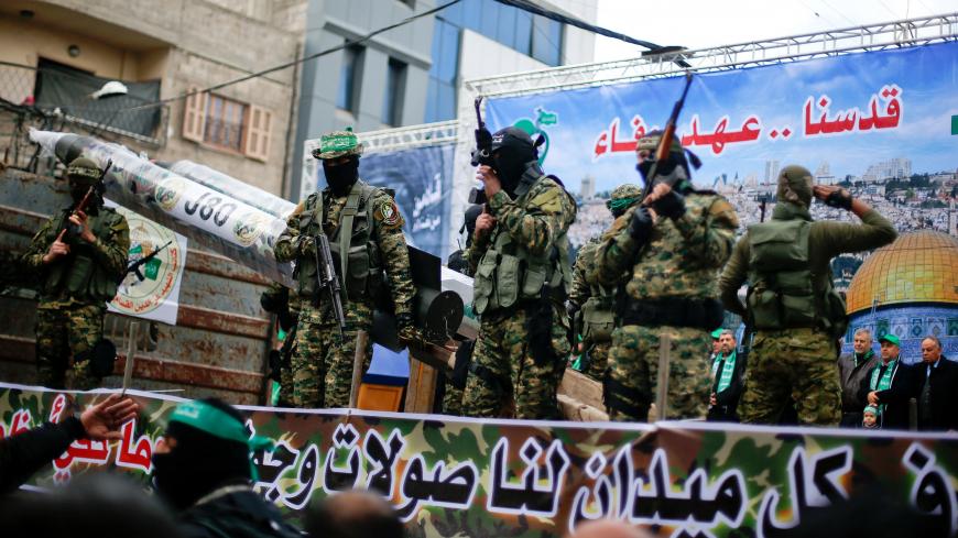 Palestinian Hamas militants display home made rockets during a rally marking the 29th anniversary of the founding of the Hamas movement, in Gaza city December 14, 2016. REUTERS/Suhaib Salem - RC18C5FCBFD0