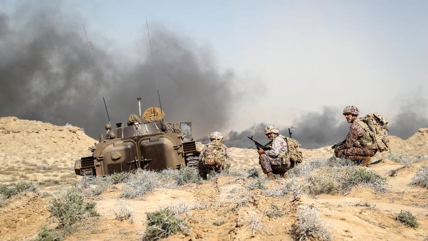 Military units of the IRGC Ground Force are seen as they launched war games in the Gulf, December 22, 2018. Hamed Malekpour/Tasnim News Agency via REUTERS ATTENTION EDITORS - THIS IMAGE WAS PROVIDED BY A THIRD PARTY. - RC1B1C2DA910