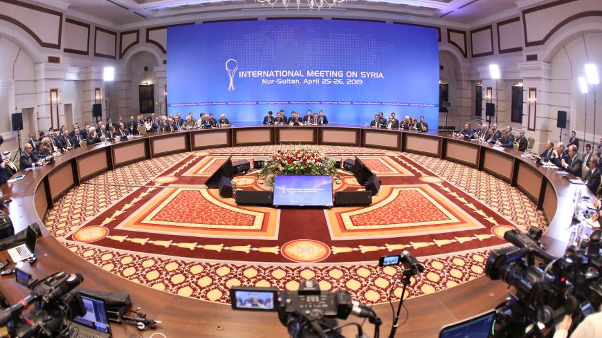 Officials attend a session of the peace talks on Syria in Nur-Sultan, Kazakhstan April 26, 2019. REUTERS/Mukhtar Kholdorbekov - RC1305474A80
