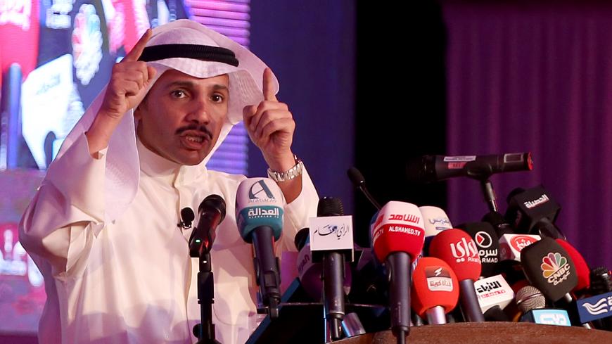 Kuwaiti candidate and former parliament speaker Marzouq al-Ghanem speaks during a campaign rally in Kuwait City on November 22, 2016. 
During the past decade, the parliament in the desert emirate has been dissolved five times by the emir due to political disputes and twice by courts over procedural flaws. The most recent occasion the emir exercised those powers was last month when he called a snap election following a crisis over petrol price hikes. / AFP / Yasser Al-Zayyat        (Photo credit should read 