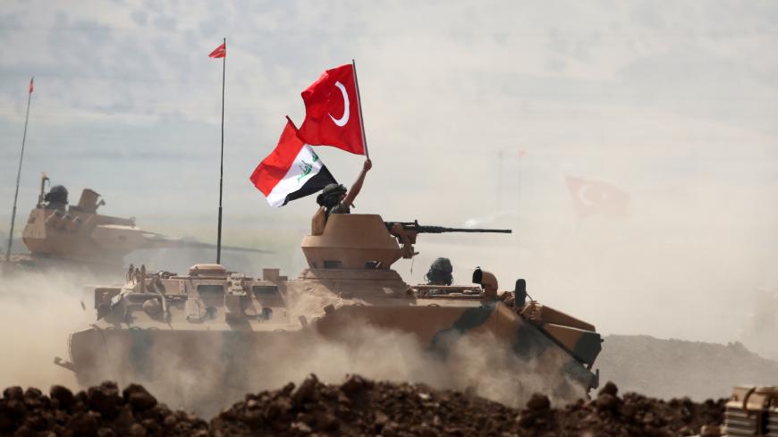 Turkish and Iraqi troops are pictured during a joint military exercise near the Turkish-Iraqi border in Silopi, Turkey September 26, 2017. REUTERS/Umit Bektas - RC1FB6450AB0