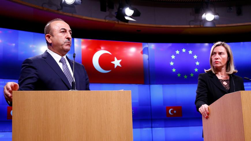 Turkish Foreign Minister Mevlut Cavusoglu and European Union foreign policy chief Federica Mogherini address a joint news conference atfer a Turkey-EU Association Council in Brussels, Belgium, March 15, 2019. REUTERS/Francois Lenoir - RC1FD5E9ABC0