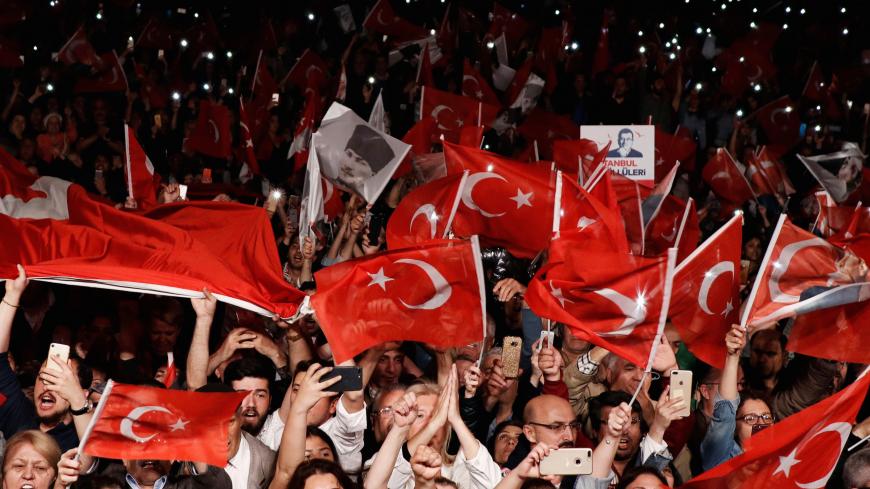 Supporters of the main opposition Republican People's Party (CHP) wave Turkish flags during a gathering to protest after the High Election Board (YSK) decided to re-run the mayoral election, in Istanbul, Turkey, May 6, 2019. REUTERS/Murad Sezer TPX IMAGES OF THE DAY - RC1DE2BFC030