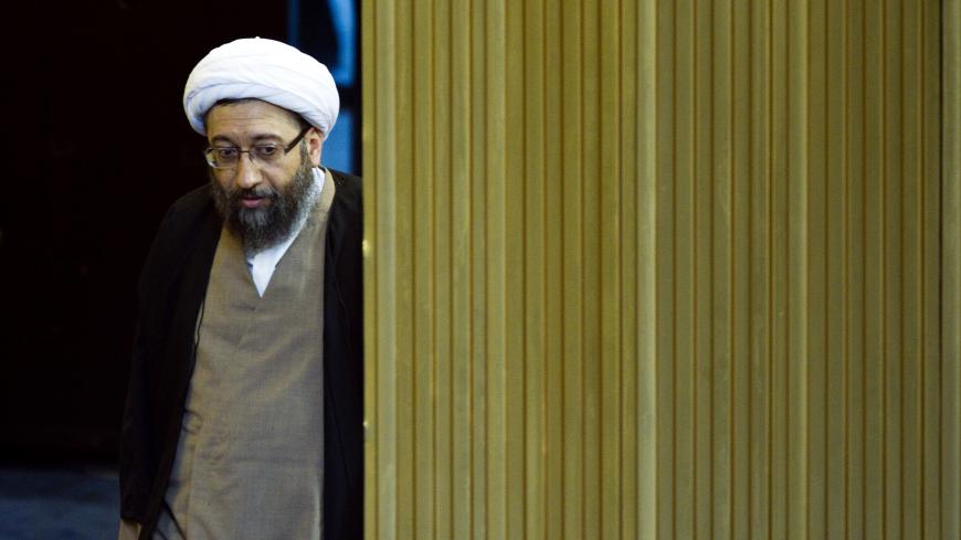 EDITORS' NOTE: Reuters and other foreign media are subject to Iranian restrictions on leaving the office to report, film or take pictures in Tehran.

Judiciary Chief Ayatollah Sadegh Larijani arrives at Iran's Assembly of Experts' biannual meeting in Tehran March 8, 2011. Former Iranian president Akbar Hashemi Rafsanjani lost his position on Tuesday as head of an important state clerical body after hardliners criticised him for being too close to the reformist opposition.  REUTERS/Raheb Homavandi (IRAN - Ta