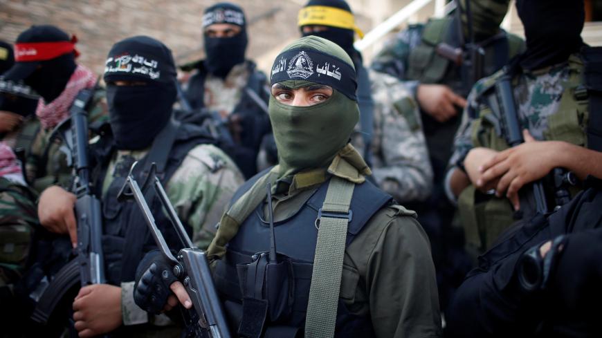 Members of various Palestinian armed factions take part in a news conference, in Gaza City September 12, 2018. REUTERS/Mohammed Salem - RC1A5369ABA0