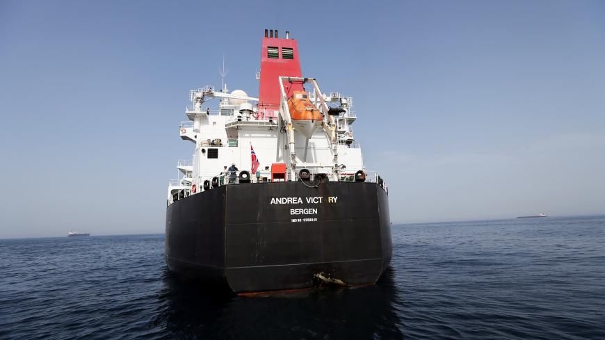 A damaged Andrea Victory ship is seen off the Port of Fujairah, United Arab Emirates, May 13, 2019. REUTERS/Satish Kumar - RC1C22EB5DB0