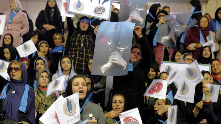 Iranian women holding electoral leaflets attend a reformist campaign for upcoming parliamentary election, in Tehran February 18, 2016. REUTERS/Raheb Homavandi/TIMA ATTENTION EDITORS - THIS IMAGE WAS PROVIDED BY A THIRD PARTY. FOR EDITORIAL USE ONLY. - GF10000314042