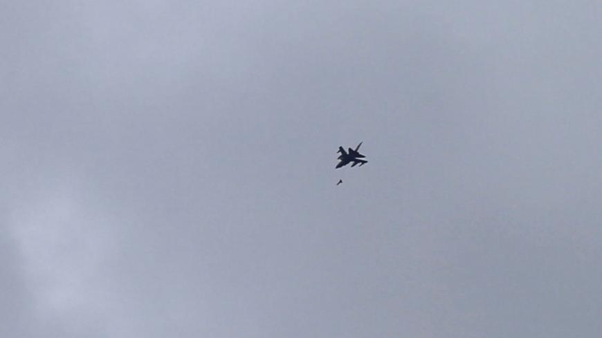 A fighter jet belonging to the Saudi-led coalition fires a missile over Sanaa, Yemen August 30, 2016. REUTERS/Khaled Abdullah - S1AETYLEDVAA