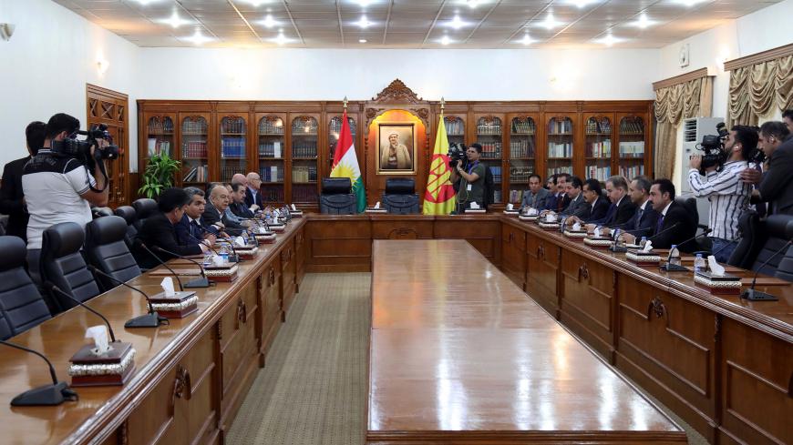 Masrour Barzani (5-R), the new Prime Minister of Iraq's autonomous Kurdistan Regional Government, meets with members of the Kurdistan Democratic Party (KDP), in Arbil on June 16, 2019. (Photo by SAFIN HAMED / AFP)        (Photo credit should read SAFIN HAMED/AFP/Getty Images)