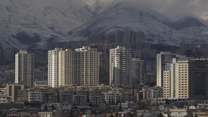 EDITORS' NOTE: Reuters and other foreign media are subject to Iranian restrictions on their ability to report, film or take pictures in Tehran. 

A general view of housing complexes in northwestern Tehran on a clear day February 12, 2011. REUTERS/Morteza Nikoubazl (IRAN - Tags: CITYSCAPE ENVIRONMENT) - GM1E72C1NY001