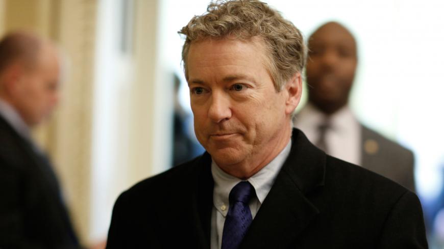 Senator Rand Paul (R-KY) walks from Senate Republican weekly policy luncheon on Capitol Hill in Washington, U.S., March 6, 2018. REUTERS/Joshua Roberts - RC1391CB83E0