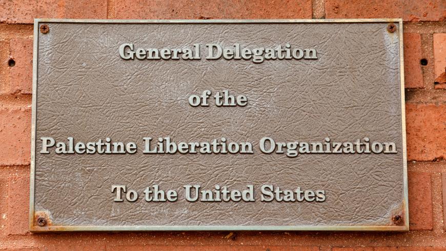 A plaque remains on the Palestine Liberation Organization (PLO) office two days after President Donald Trump's national security adviser John Bolton announced that the State Department would close the PLO office in Washington, U.S., September 12, 2018.  REUTERS/Kevin Lamarque - RC1FFC939370