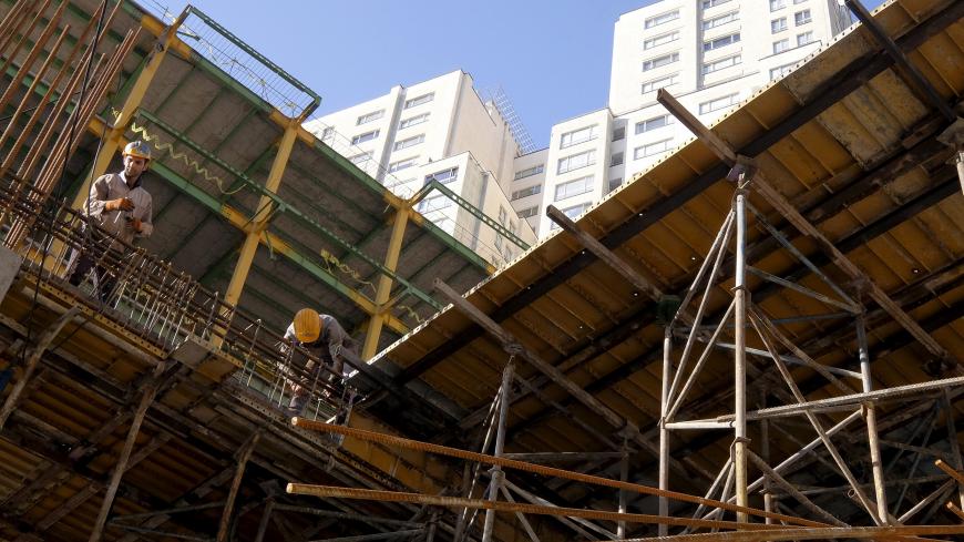Labourers work at the construction site of a building in Tehran, Iran January 20, 2016. To match IRAN-NUCLEAR/INVESTMENT   REUTERS/Raheb Homavandi/TIMA  ATTENTION EDITORS - THIS IMAGE WAS PROVIDED BY A THIRD PARTY. FOR EDITORIAL USE ONLY.   - GF20000100968