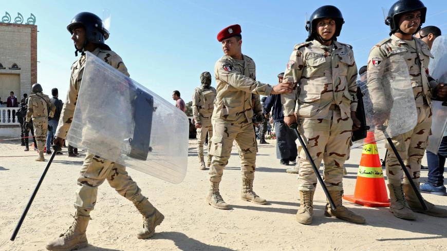 Military forces are seen in North Sinai, Egypt, December 1, 2017. Picture taken December 1, 2017. REUTERS/Mohamed Abd El Ghany - RC158CDC6DE0