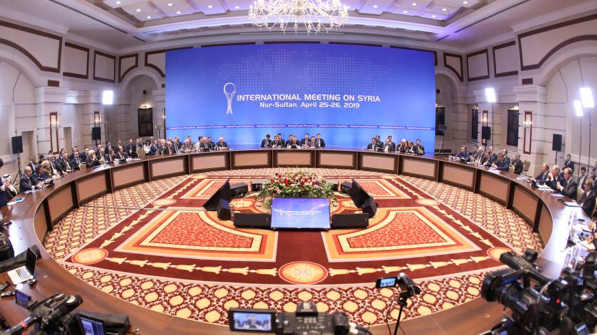 Officials attend a session of the peace talks on Syria in Nur-Sultan, Kazakhstan April 26, 2019. REUTERS/Mukhtar Kholdorbekov - RC1305474A80
