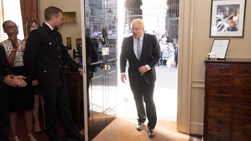 Britain's Prime Minister Boris Johnson enters 10 Downing Street after meeting Britain's Queen Elizabeth II and accepting her invitation to become Prime Minister and form a new government, in London, Britain July 24, 2019. Stefan Rousseau/Pool via REUTERS - RC1D5AEAAC20