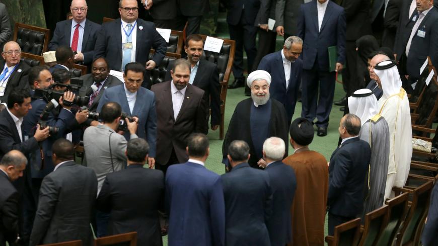 Iranian president Hassan Rouhani arrives for his swearing-in ceremony for a further term, at the parliament in Tehran, Iran, August 5, 2017. Nazanin Tabatabaee Yazdi/TIMA via REUTERS ATTENTION EDITORS - THIS IMAGE WAS PROVIDED BY A THIRD PARTY. - RC1E6A273D30