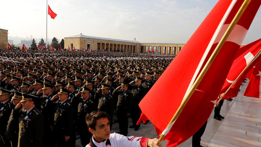 Military officers stand at attention during a ceremony at the mausoleum of Mustafa Kemal Ataturk, marking Ataturk's death anniversary, in Ankara, Turkey November 10, 2018. REUTERS/Umit Bektas - RC165A2F96B0