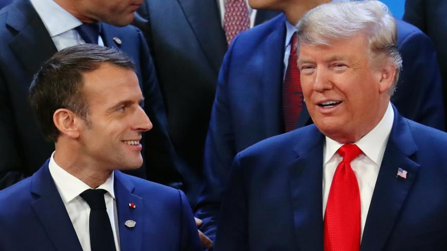 French President Emmanuel Macron and U.S. President Donald Trump prepare for a family photo during the G20 summit in Buenos Aires, Argentina November 30, 2018. REUTERS/Marcos Brindicci - RC1A3EBD6BF0