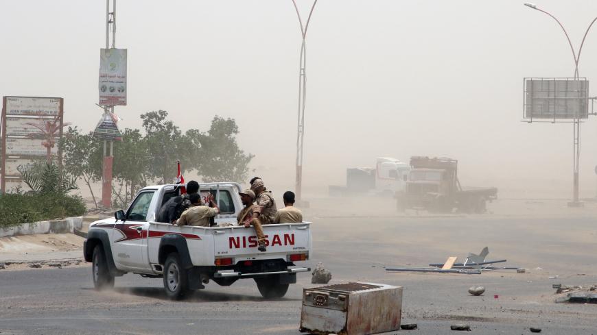 Members of UAE-backed southern Yemeni separatist forces patrol a road during clashes with government forces in Aden, Yemen August 10, 2019. REUTERS/Fawaz Salman - RC14A6592690
