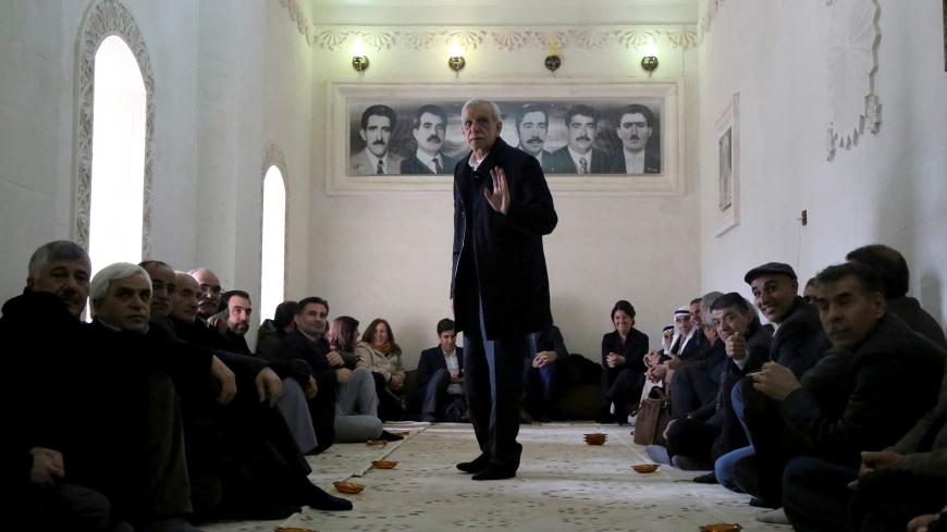 Ahmet Turk, 74, a veteran Kurdish politician, welcomes guests at his home after he was released from prison where he was held for more than two months as part of a terrorism investigation, in Kiziltepe, a town in southeastern province of Mardin, February 5, 2017. REUTERS/Sertac Kayar - RC1999B22780