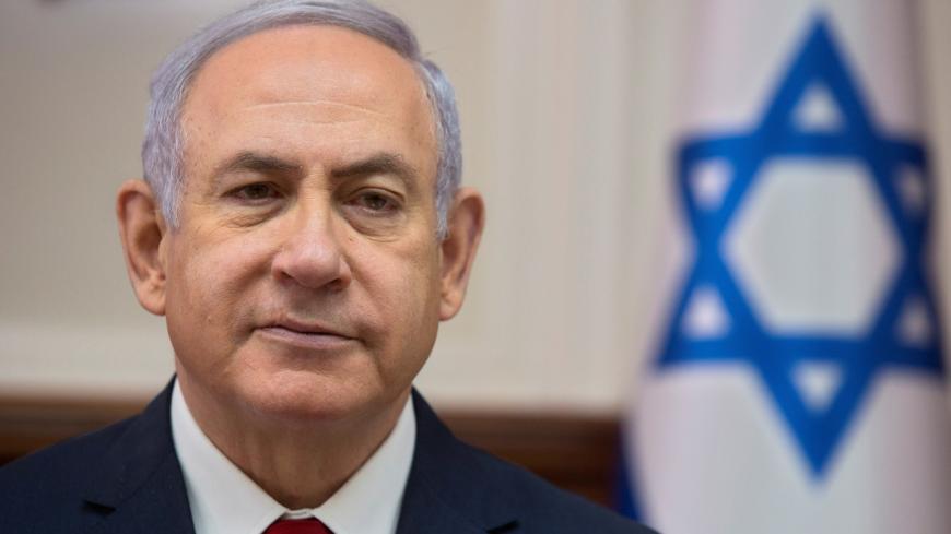 Israeli Prime Minister Benjamin Netanyahu attends the weekly cabinet meeting at the Prime Minister's office in Jerusalem February 17, 2019. Sebastian Scheiner/Pool via REUTERS *** Local Caption *** - RC1F7CF03220