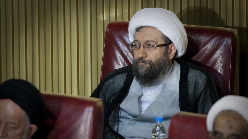 EDITORS' NOTE: Reuters and other foreign media are subject to Iranian restrictions on leaving the office to report, film or take pictures in Tehran.

Ayatollah Sadeq Larijani, head of Iran's Judiciary, listens to the opening speech during the Assembly of Experts' biannual meeting in Tehran September 14, 2010.  REUTERS/Caren Firouz (IRAN - Tags: POLITICS RELIGION CRIME LAW) - GM1E69E15YO01