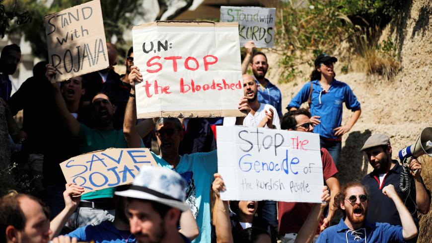 Israelis protest in support of the Kurdish people opposite to the Turkish embassy in Tel Aviv, Israel October 13, 2019. REUTERS/Amir Cohen - RC17449A4DA0
