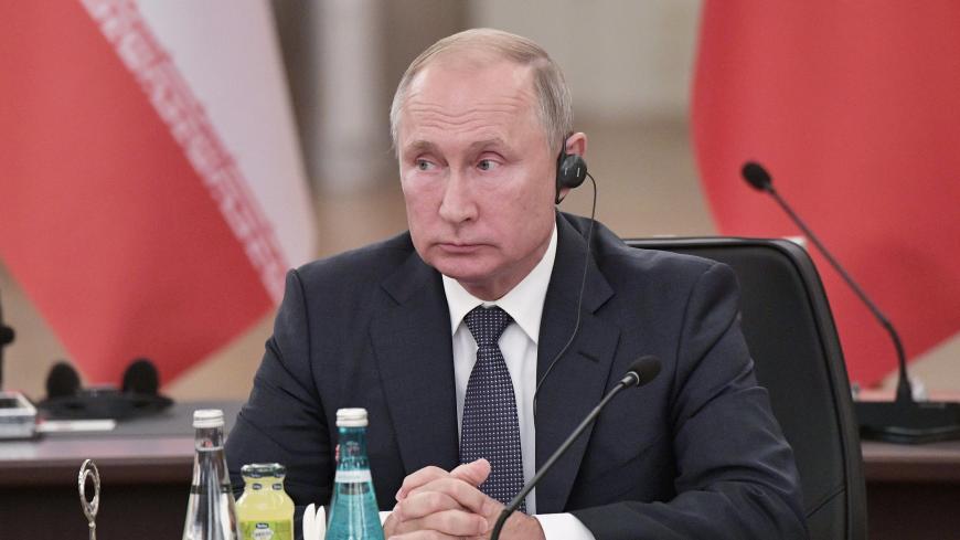 Russian President Vladimir Putin is seen during trilateral talks with his counterparts Hassan Rouhani of Iran and Tayyip Erdogan of Turkey in Ankara, Turkey September 16, 2019. Sputnik/Valery Melnikov/Kremlin via REUTERS  ATTENTION EDITORS - THIS IMAGE WAS PROVIDED BY A THIRD PARTY. - RC1A1133AD90
