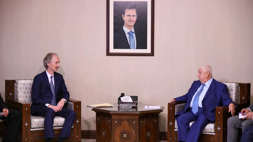 UN Special Envoy for Syria, Geir Pedersen meets with Syria's Foreign Minister Walid Muallem in Damascus, Syria in this handout released by SANA on September 23, 2019. SANA/Handout via REUTERS ATTENTION EDITORS - THIS IMAGE WAS PROVIDED BY A THIRD PARTY. REUTERS IS UNABLE TO INDEPENDENTLY VERIFY THIS IMAGE. - RC1563B6A370