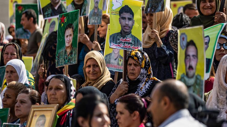 Syrian Kurds demonstrate in front of the United Nations offices in the Kurdish-majority city of Qamishli in northeast Syria on October 2, 2019 over their exclusion from the UN-backed constitutional committee. - The United Nations on September 23 announced the long-awaited formation of the committee which includes the government and opposition, but it remained to be seen if the step could finally end the civil war. (Photo by Delil SOULEIMAN / AFP) (Photo by DELIL SOULEIMAN/AFP via Getty Images)