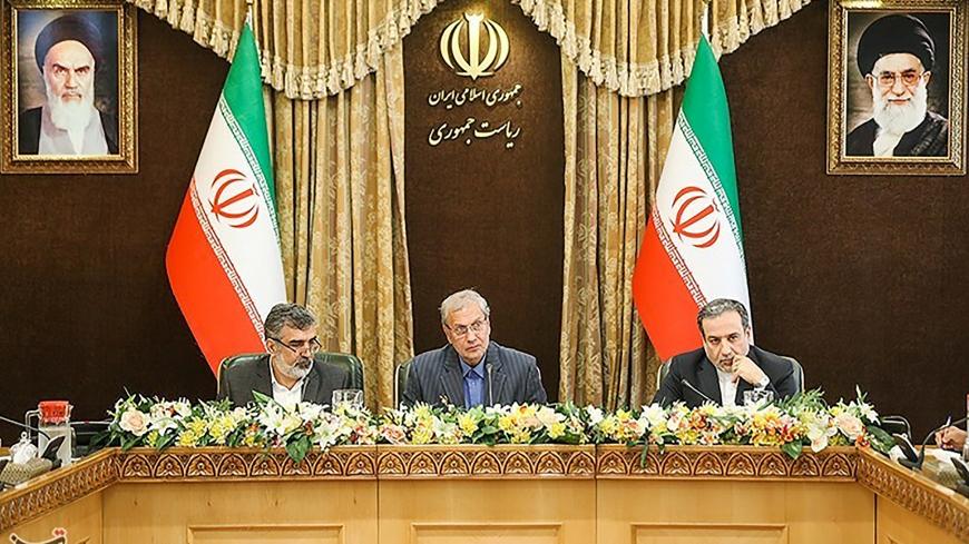 Abbas Araqchi, Iranian deputy foreign minister for political affairs (R), Behrouz Kamalvandi, Iran's Atomic Energy Organization spokesman (L) and Iran's government spokesman Ali Rabiei attend a news conferenece in Tehran, Iran July 7, 2019.  Tasnim News Agency/Handout via REUTERS. THIS IMAGE HAS BEEN SUPPLIED BY A THIRD PARTY. - RC188882BBC0