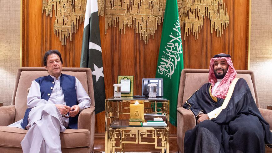 Saudi Arabia's Crown Prince Mohammed bin Salman meets with Pakistani Prime Minister Imran Khan in Riyadh, Saudi Arabia, October 15, 2019. Bandar Algaloud/Courtesy of Saudi Royal Court/Handout via REUTERS ATTENTION EDITORS - THIS IMAGE WAS PROVIDED BY A THIRD PARTY. - RC16CE5018F0
