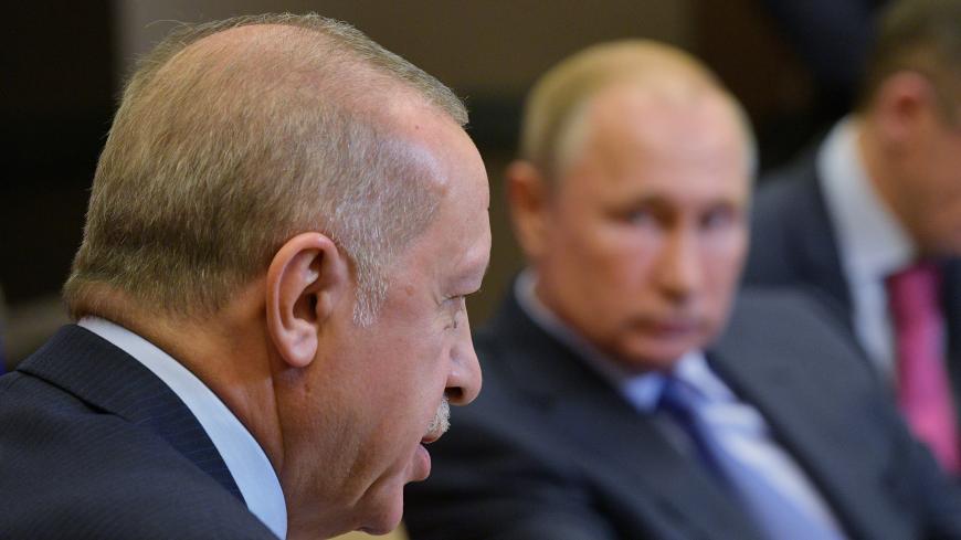 Turkish President Tayyip Erdogan speaks during a meeting with Russian President Vladimir Putin in Sochi, Russia October 22, 2019. Sputnik/Alexei Druzhinin/Kremlin via REUTERS ATTENTION EDITORS - THIS IMAGE WAS PROVIDED BY A THIRD PARTY. - RC11687C0E70