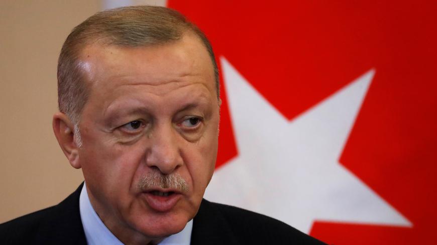 Turkish President Recep Tayyip Erdogan attends a joint news conference with Russian President Vladimir Putin (not pictured) following Russian-Turkish talks in the Black sea resort of Sochi, Russia October 22, 2019. Sergei Chirikov/Pool via REUTERS - RC16B3888800