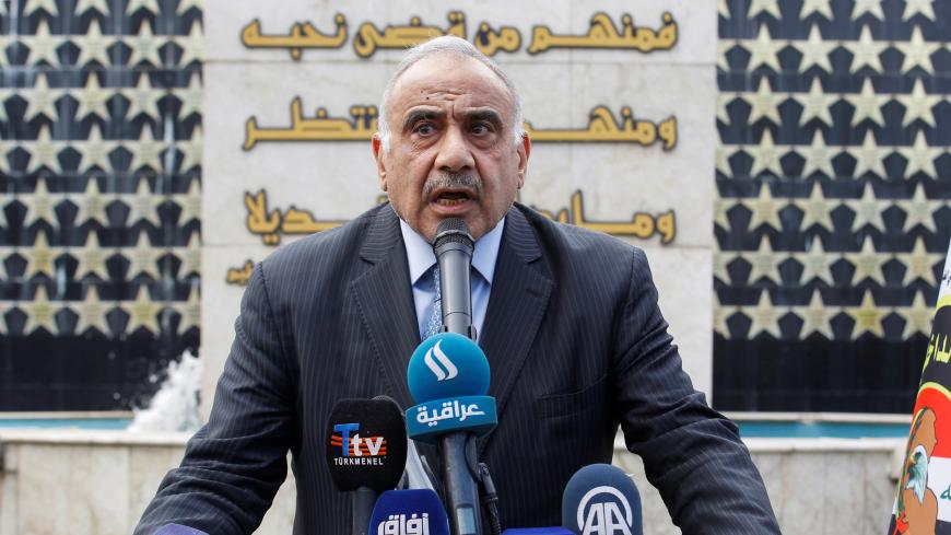 Iraqi Prime Minister Adel Abdul Mahdi speaks during a symbolic funeral ceremony of Major General Ali al-Lami, who commands the Iraqi Federal Police's Fourth Division, who was killed in Salahuddin, in Baghdad, Iraq October 23, 2019. REUTERS/Khalid al-Mousily - RC115CD84880