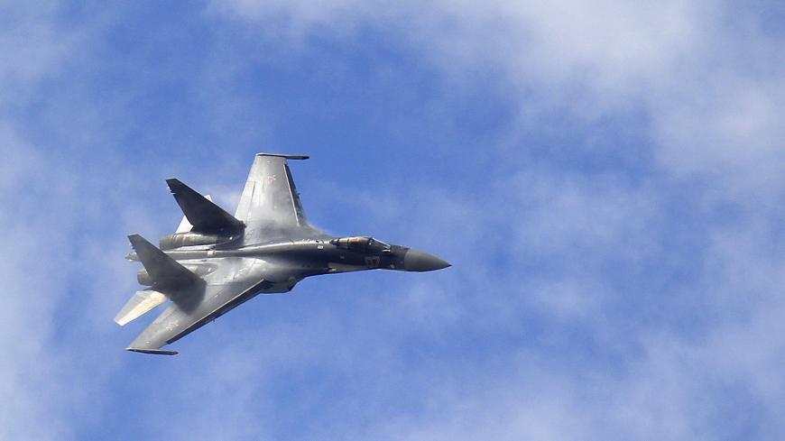 A Sukhoi SU-35 fighter aircraft participates in a flying display during the 50th Paris Air Show at the Le Bourget airport near Paris, June 23, 2013.  REUTERS/Pascal Rossignol (FRANCE - Tags: BUSINESS TRANSPORT MILITARY) - GM1E96N1SN701