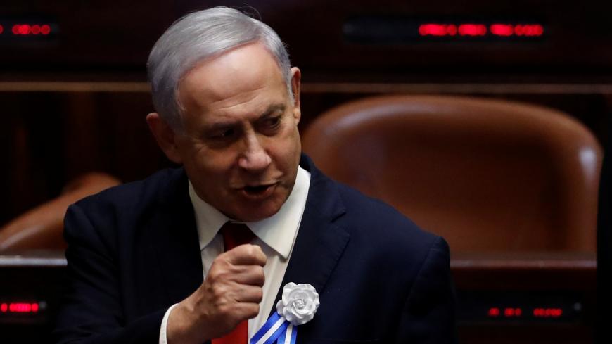 Israeli Prime Minister Benjamin Netanyahu attends the swearing-in ceremony of the 22nd Knesset, the Israeli parliament, in Jerusalem October 3, 2019. REUTERS/Ronen Zvulun - RC16598490B0