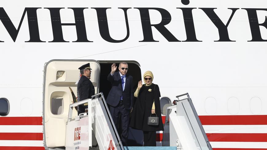 ANKARA, TURKEY - NOVEMBER 12: Turkish President Recep Tayyip Erdogan (2nd R) and his wife Emine Erdogan (R) are seen before their departure to Washington from the Esenboga Airport in Ankara, Turkey on November 12, 2019. (Photo by Ercin Top/Anadolu Agency via Getty Images)