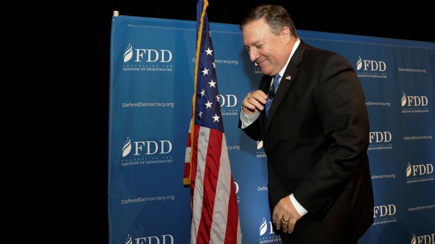 CIA Director Mike Pompeo leaves the FDD National Security Summit in Washington, U.S., October 19, 2017. REUTERS/Yuri Gripas - RC1B22933190