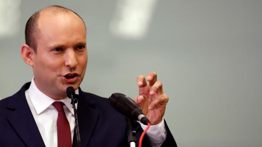 Israeli Education Minister Naftali Bennett gestures as he delivers a statement to members of the media, at the Knesset, Israel's parliament, in Jerusalem November 19, 2018. REUTERS/Amir Cohen - RC1DC3C46DA0