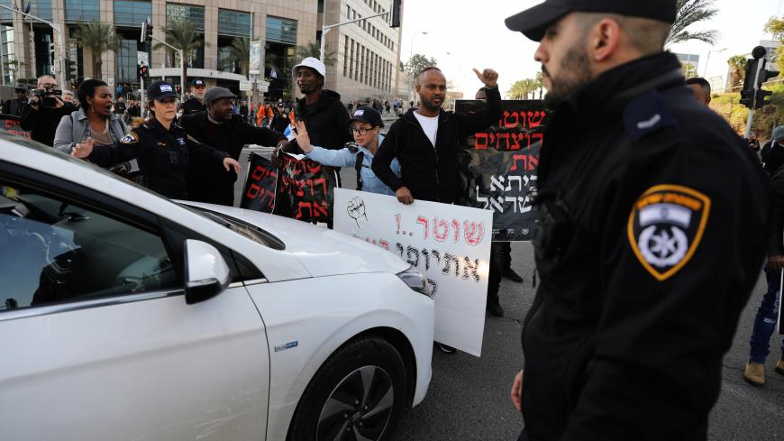 Israelis protesters, some of Ethiopian decent, take part in a demonstration against police brutality, following the death of an Israeli Ethiopian community member, Yehuda Biadga, in Tel Aviv, Israel January 30, 2019. REUTERS/Ammar Awad - RC11639E9D10