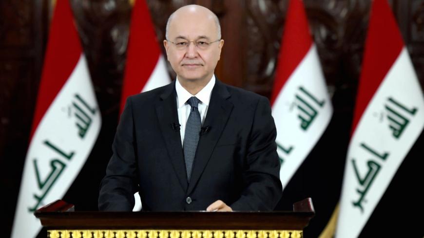 Iraq's President Barham Salih delivers a televised speech to people in Baghdad, Iraq October 31, 2019. The Presidency of the Republic of Iraq Office/Handout via REUTERS ATTENTION EDITORS - THIS IMAGE WAS PROVIDED BY A THIRD PARTY. - RC1A7B372D10