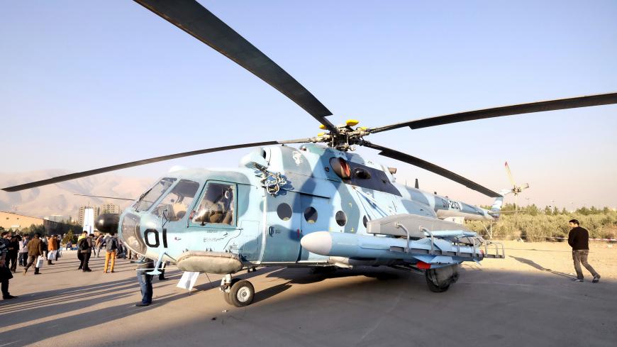 A missile made by Revolutionary Guard is mounted on a Chinese helicopter during the 6th exhibition of aviation industry in Tehran, Iran, November 25, 2015. REUTERS/Raheb Homavandi/TIMA  ATTENTION EDITORS - THIS IMAGE WAS PROVIDED BY A THIRD PARTY. FOR EDITORIAL USE ONLY. - GF20000073553