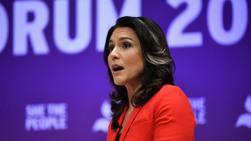 U.S. Democratic presidential candidate Tulsi Gabbard participates in the She the People Presidential Forum in Houston, Texas, U.S. April 24, 2019.  REUTERS/Loren Elliott - RC150AA15E20