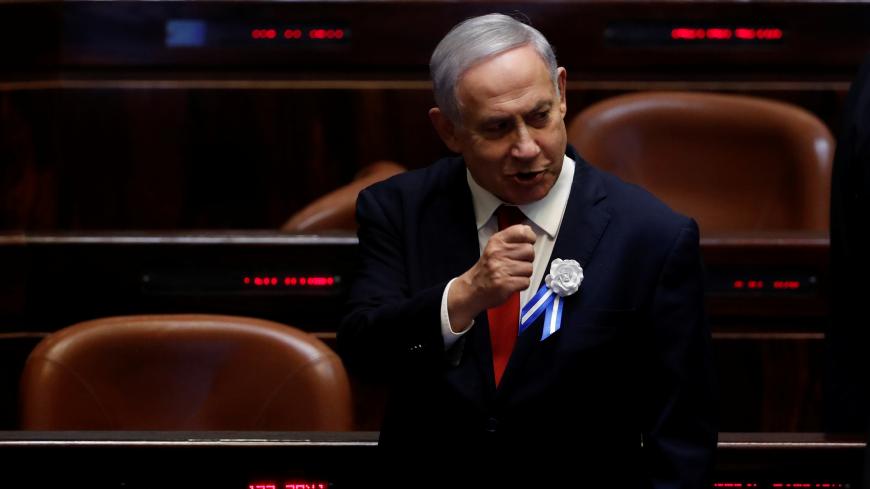 Israeli Prime Minister Benjamin Netanyahu attends the swearing-in ceremony of the 22nd Knesset, the Israeli parliament, in Jerusalem October 3, 2019. REUTERS/Ronen Zvulun - RC17D5CCC6B0