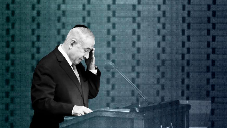 Israeli Prime Minister Benjamin Netanyahu gestures as he speaks during a memorial ceremony for Israeli soldiers killed in the 1973 Middle East War at Mount Herzl Military Cemetery in Jerusalem October 10, 2019. REUTERS/Ronen Zvulun - RC164B9F1A90