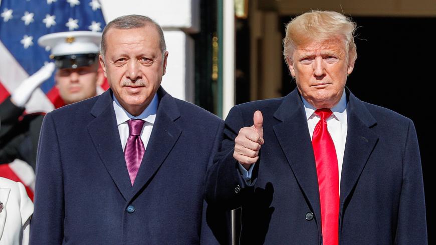 U.S. President Donald Trump welcomes Turkey's Pressident Tayyip Erdogan at the White House in Washington, U.S., November 13, 2019. REUTERS/Tom Brenner TPX IMAGES OF THE DAY - RC2HAD9SK03C