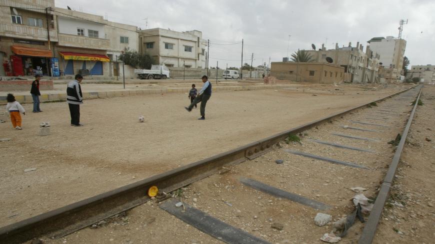 MAFRAQ, JORDAN- MARCH 14: Children play along disused parts of the Hejaz Railway on March 14, 2007 in Mafraq, Jordan. The railway is part of a broad regional collaboration project the Israeli government has approved, including the creation of a railway linking Jordan to the northern Israeli port of Haifa. Built by over 10,000 Turkish soldiers directed by German engineer Heinrich Meissner at the turn of the century, the railway was originally conceived as a means to transport Muslim pilgrims from Istanbul to